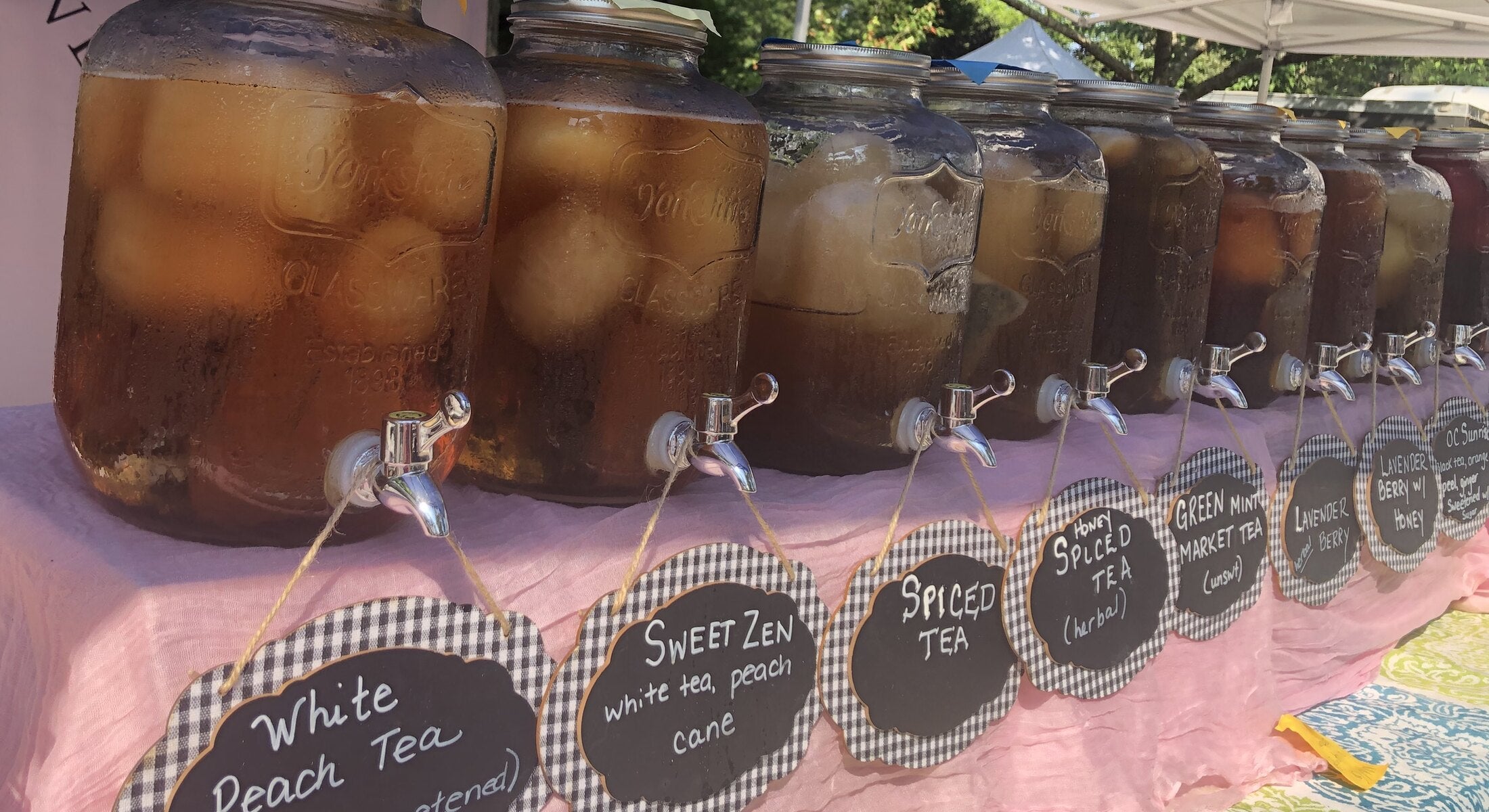 Belle Grove Tea Co iced teas lined up at the market