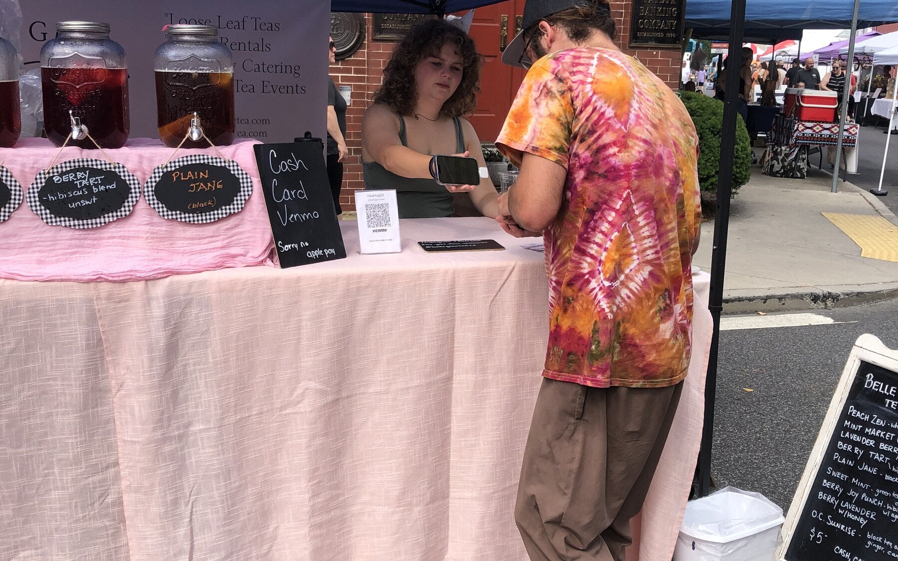 Belle Grove Tea Co serving iced tea and loose-leaf tea at a community market